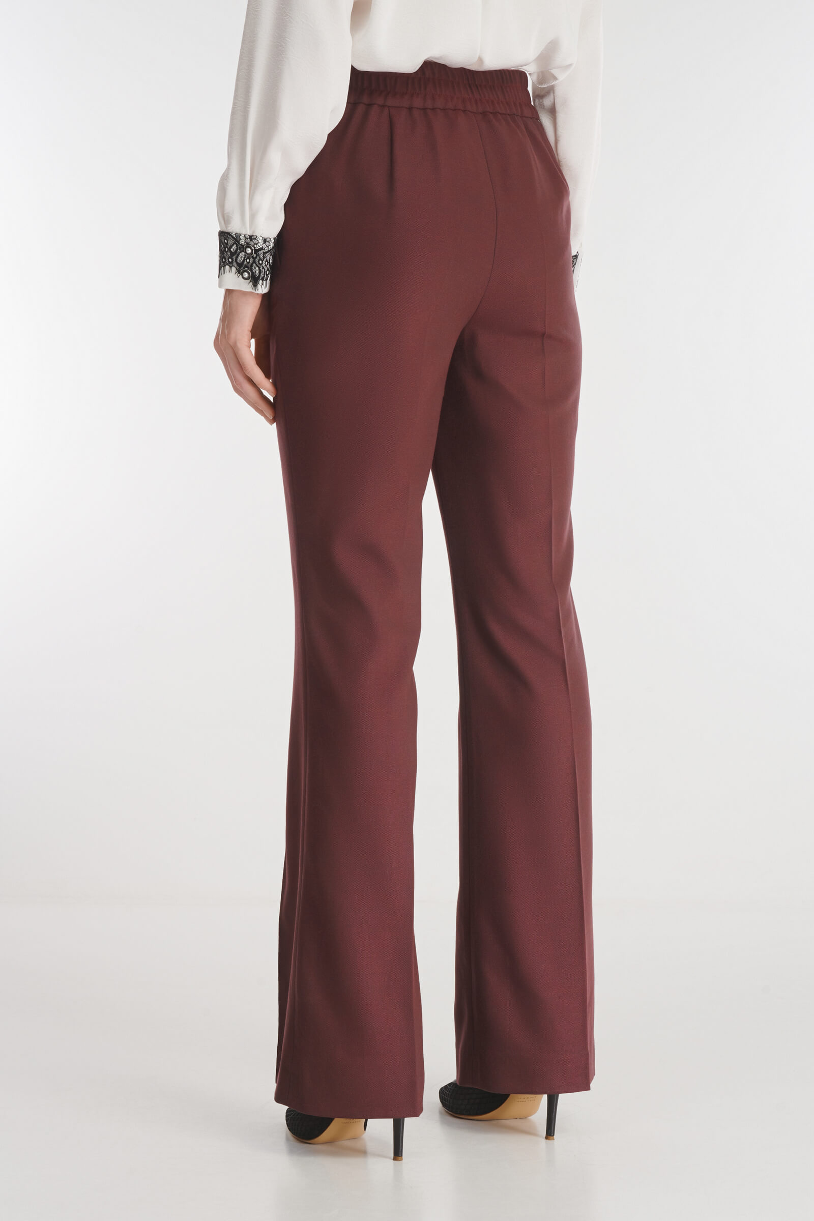 Расклешенные брюки с акцентным поясом Бренд Caterina Leman