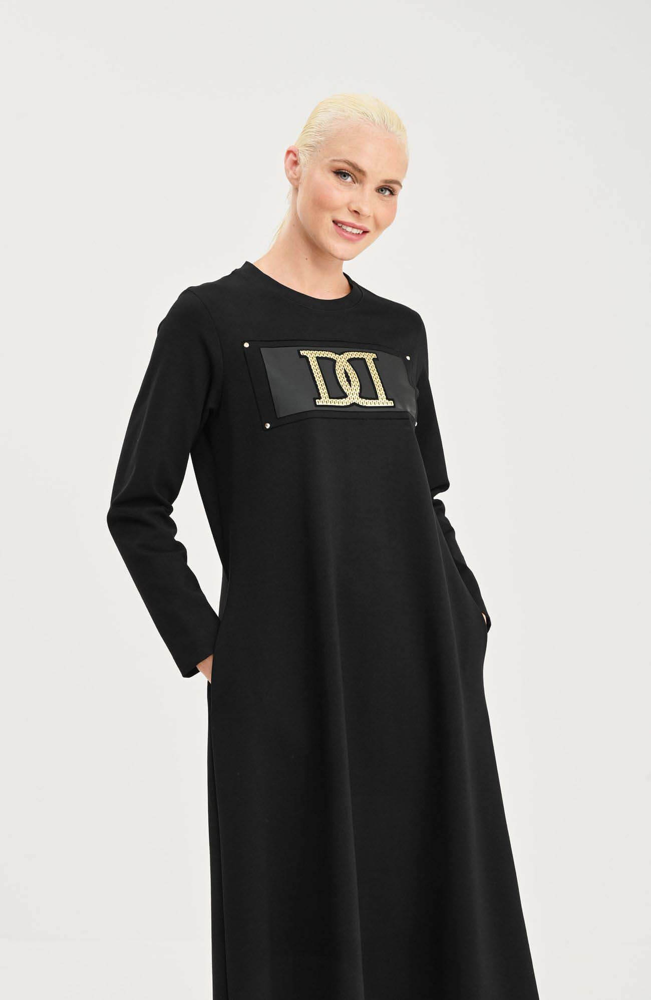 Трикотажное расклешенное платье Бренд Daniela Drei