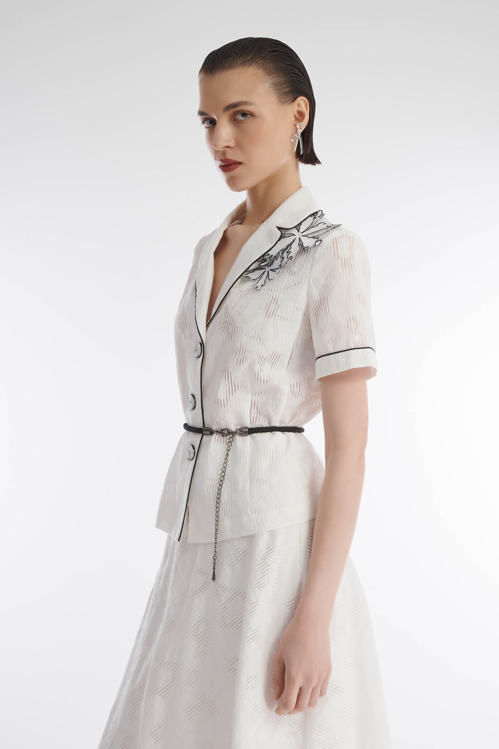 Жакет с перфорацией и нашивками Бренд Caterina Leman