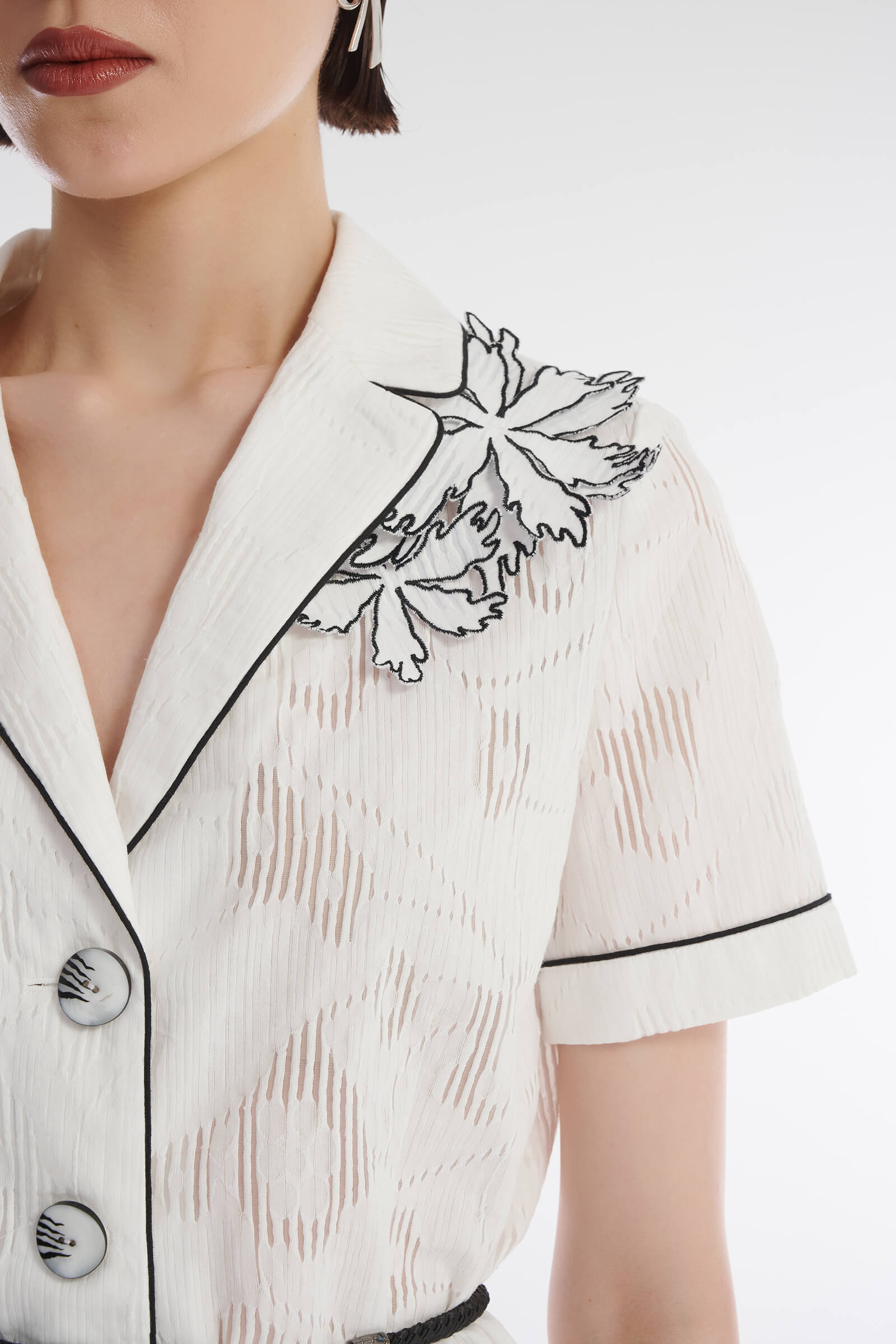 Жакет с перфорацией и нашивками Бренд Caterina Leman