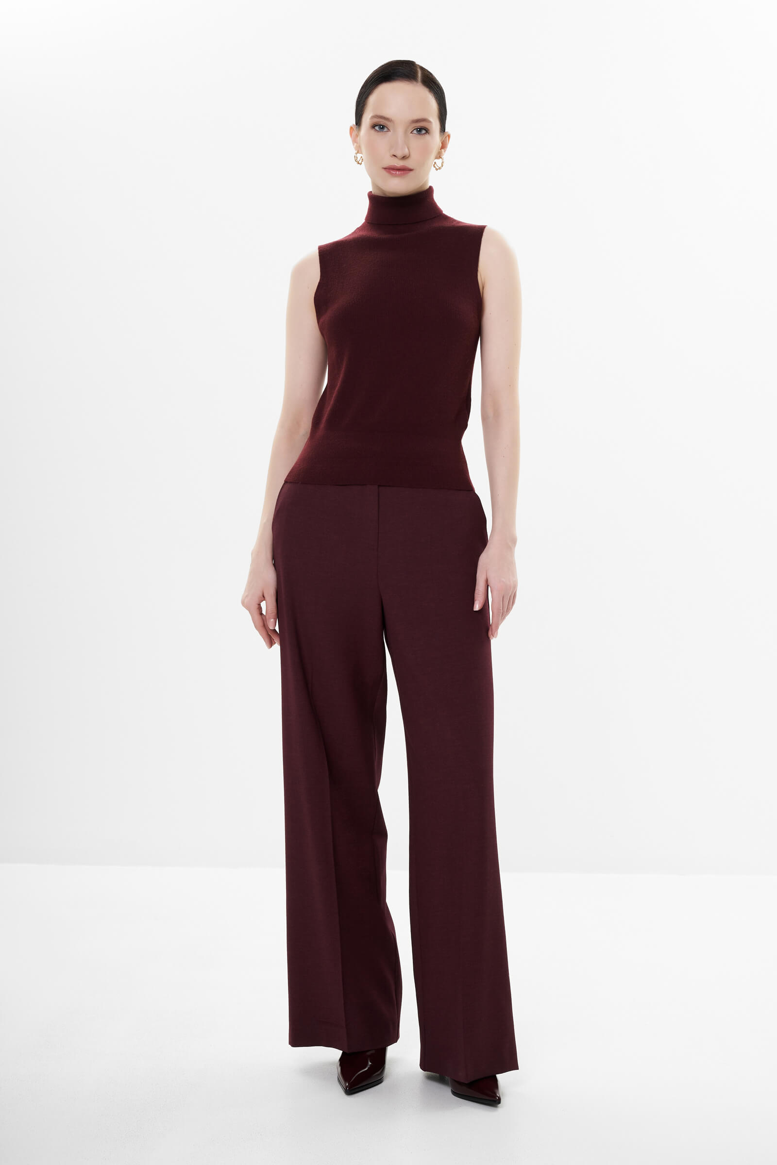 Шерстяная водолазка в рубчик Бренд Diana Gallesi