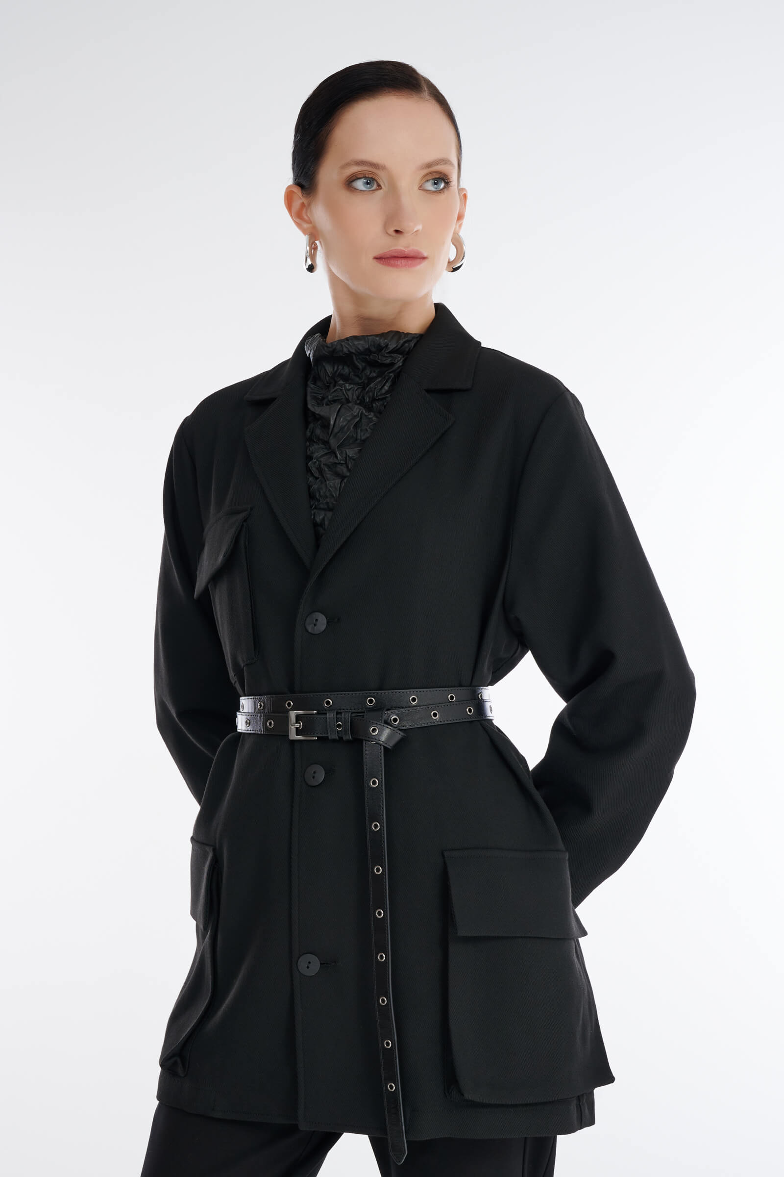 Тонкий кожаный ремень с люверсами Бренд Sarah Pacini