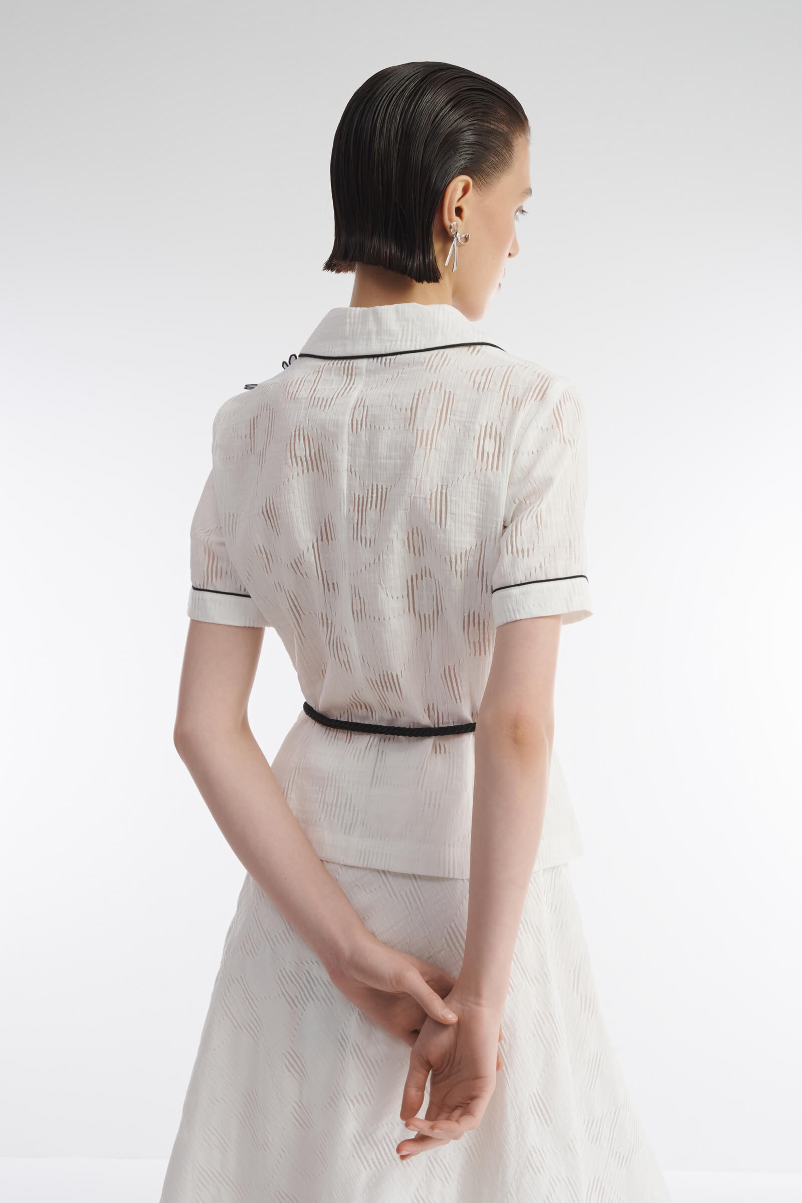 Жакет с перфорацией и нашивками Бренд Caterina Leman