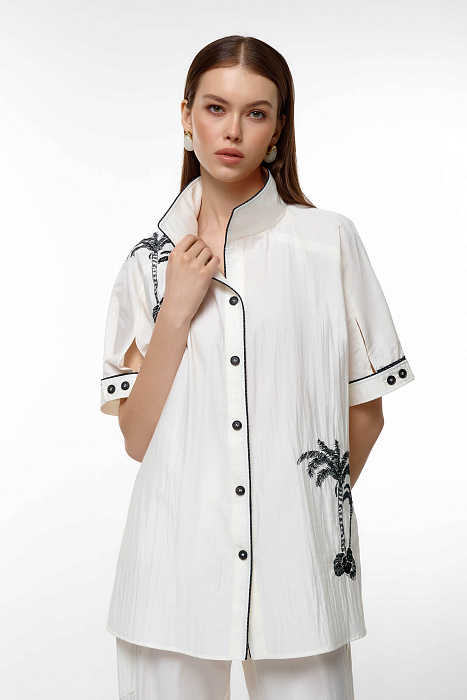 Удлиненная блузка с контрастной окантовкой и рисунком Бренд Caterina Leman